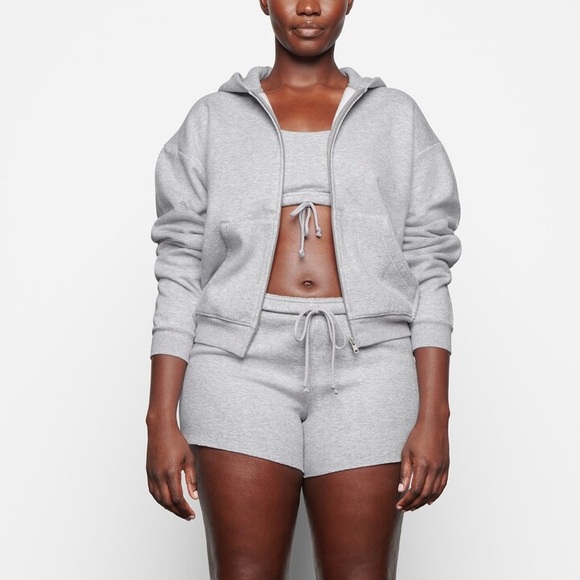 Skims Cotton Fleece Zip Up Hoodie in Heather Grey - Picture 1 of 8